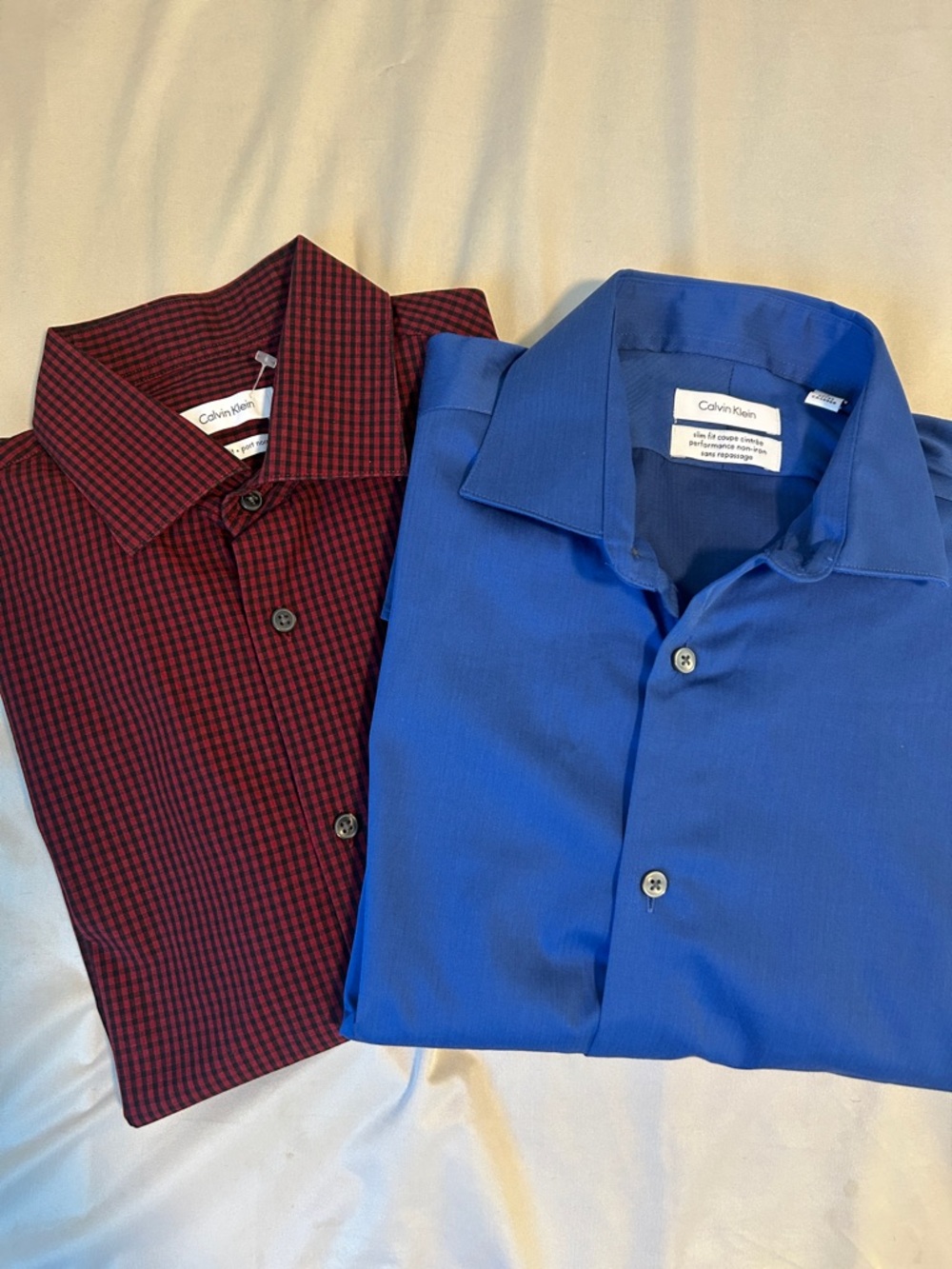 Calvin Klein Blue Button-Up Dress Shirt with Red Checked Shirt Behind